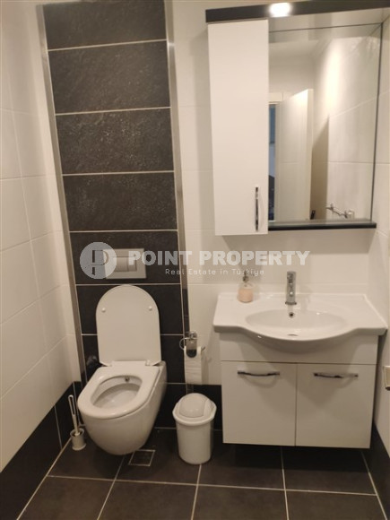 Двухуровневая квартира с двумя спальными комнатами в 300 метрах от моря в районе Кестель.-id-3963-фото-6