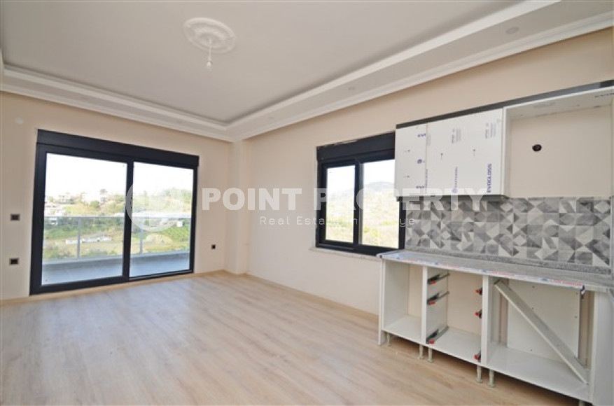 Апартаменты с двумя спальнями, 95 м² в новом комплексе с бассейном в районе Демирташ, Аланья-id-2341-фото-2