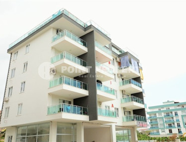Bright and comfortable 1+1 apartment with an area of 60 m2 in a low-rise complex in Mahmutlar district-id-3976-photo-1