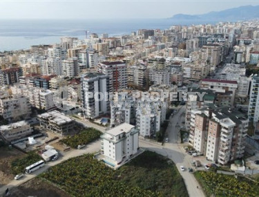 Bright and comfortable 1+1 apartment with an area of 60 m2 in a low-rise complex in Mahmutlar district-id-3976-photo-2