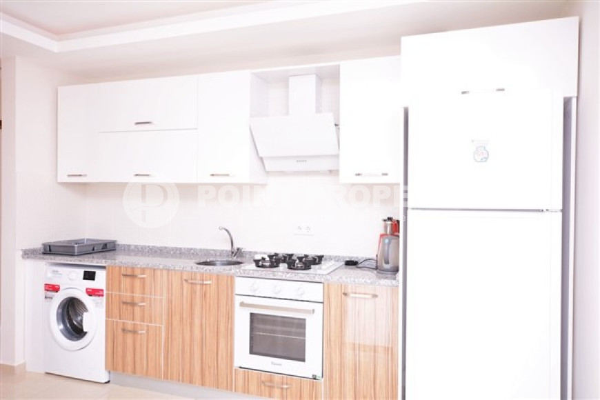 Светлая и удобная квартира 1+1 с площадью 60 м2 в малоэтажном комплексе района Махмутлар-id-3976-фото-7