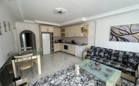 Bright furnished apartment 2+1 700 meters from the sea in the prestigious Tosmur area of Alanya.-id-3985-photo-1
