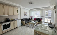 Bright furnished apartment 2+1 700 meters from the sea in the prestigious Tosmur area of Alanya.-id-3985-photo-2