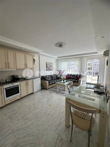 Bright furnished apartment 2+1 700 meters from the sea in the prestigious Tosmur area of Alanya.-id-3985-photo-2