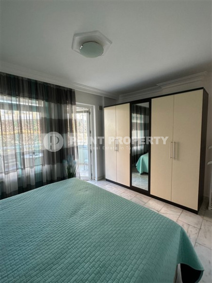 Bright furnished apartment 2+1 700 meters from the sea in the prestigious Tosmur area of Alanya.-id-3985-photo-5