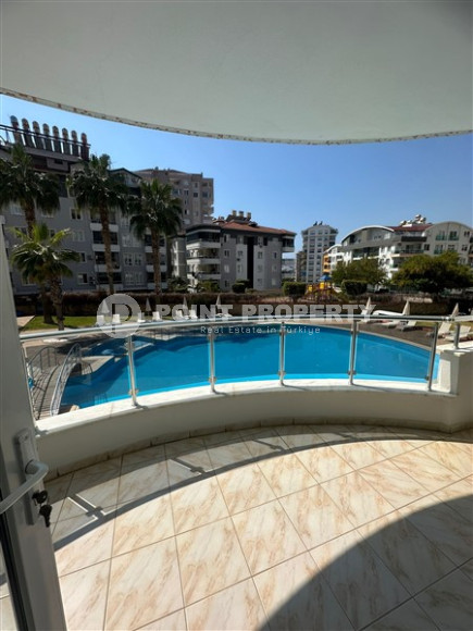 Bright furnished apartment 2+1 700 meters from the sea in the prestigious Tosmur area of Alanya.-id-3985-photo-8