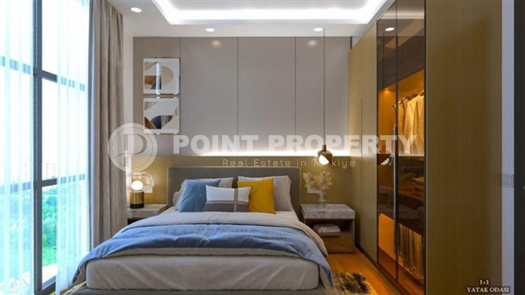 Небольшая квартира 1+1 в новом доме на финальной стадии строительства в районе Авсаллар.-id-3987-фото-2