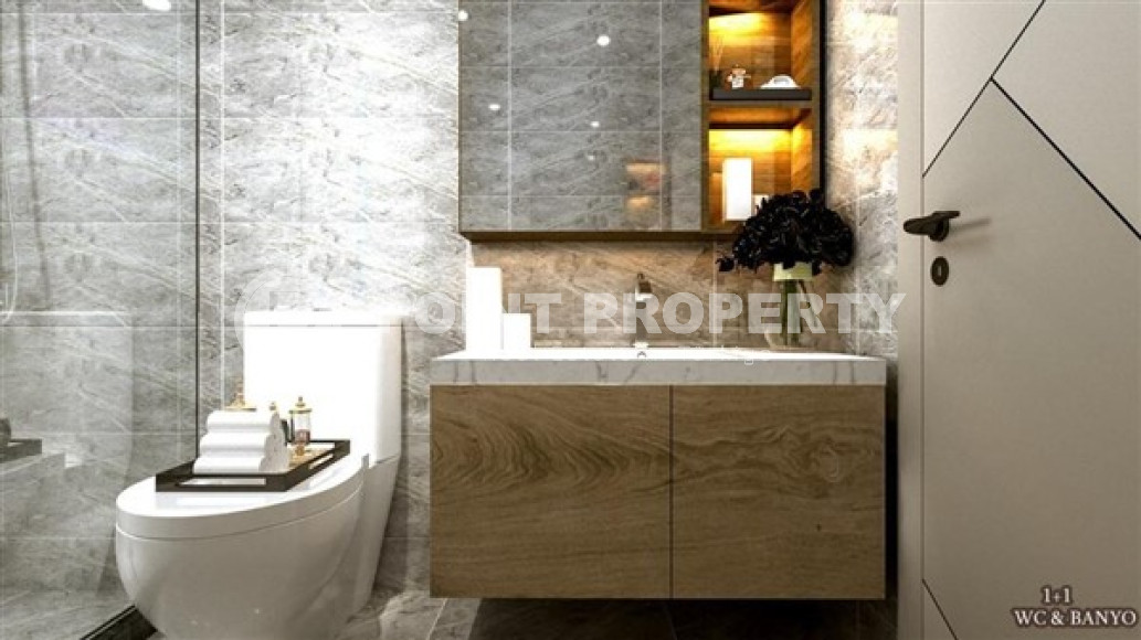 Небольшая квартира 1+1 в новом доме на финальной стадии строительства в районе Авсаллар.-id-3987-фото-10