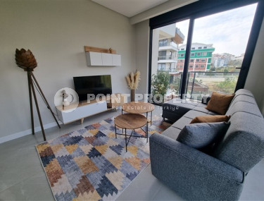 Beautiful studio apartment with modern design in the popular Oba area of Alanya.-id-3988-photo-1