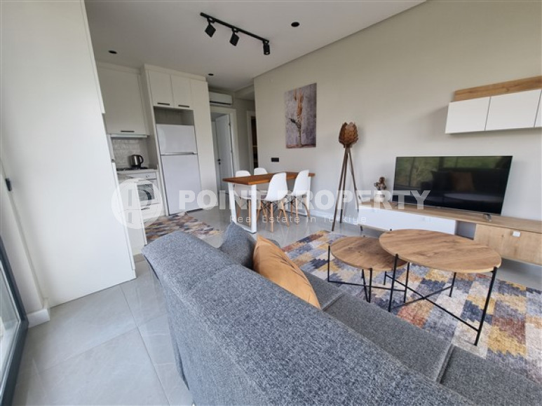 Beautiful studio apartment with modern design in the popular Oba area of Alanya.-id-3988-photo-2