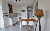 Beautiful studio apartment with modern design in the popular Oba area of Alanya.-id-3988-photo-4