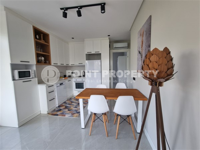 Beautiful studio apartment with modern design in the popular Oba area of Alanya.-id-3988-photo-4