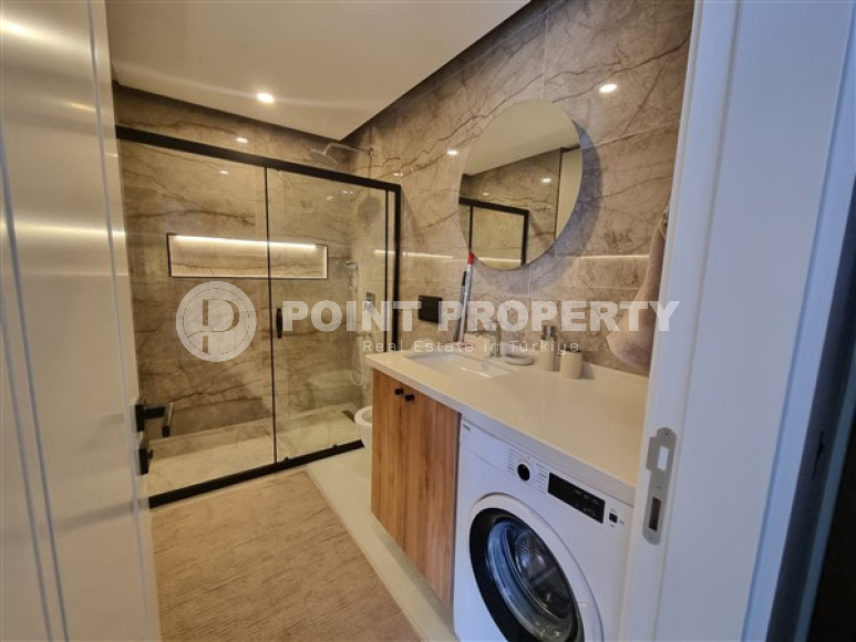 Beautiful studio apartment with modern design in the popular Oba area of Alanya.-id-3988-photo-7