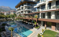 Beautiful studio apartment with modern design in the popular Oba area of Alanya.-id-3988-photo-15