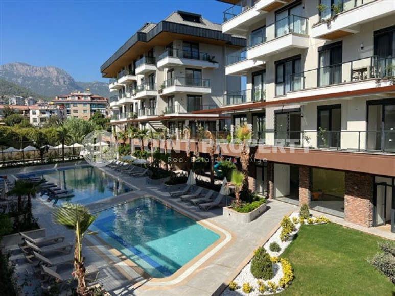 Beautiful studio apartment with modern design in the popular Oba area of Alanya.-id-3988-photo-15