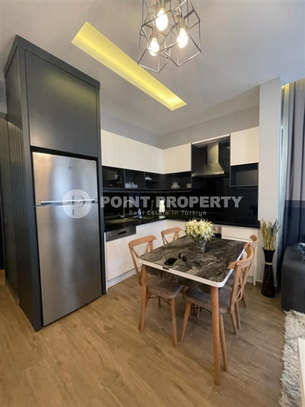 Элегантные апартаменты 2+1 с площадью 71 м2 в 300 метрах от Средиземного моря, центр Аланьи-id-3997-фото-5