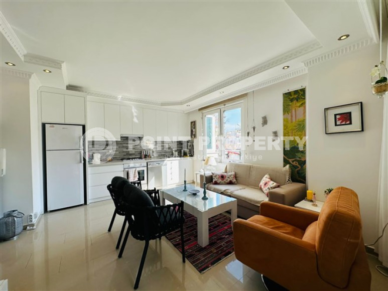 Светлая меблированная квартира 2+1 в 150 метрах от пляжа в центре популярного района Аланьи Оба.-id-4001-фото-4