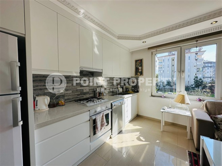 Светлая меблированная квартира 2+1 в 150 метрах от пляжа в центре популярного района Аланьи Оба.-id-4001-фото-6