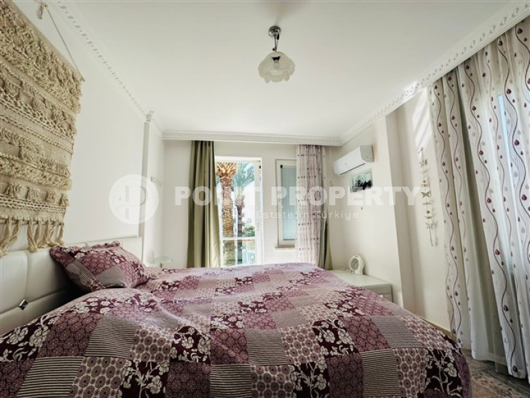 Светлая меблированная квартира 2+1 в 150 метрах от пляжа в центре популярного района Аланьи Оба.-id-4001-фото-9