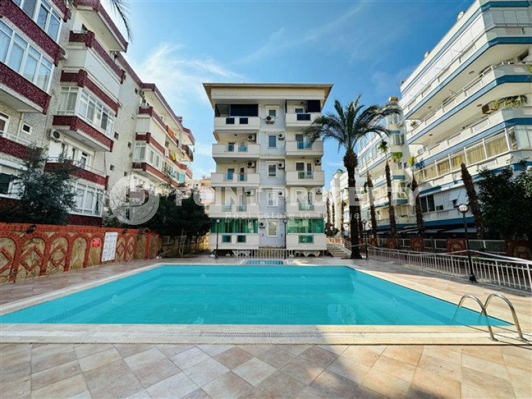 Светлая меблированная квартира 2+1 в 150 метрах от пляжа в центре популярного района Аланьи Оба.-id-4001-фото-12