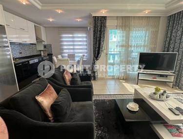 Современные апартаменты 2+1, общей площадью 120 м2, в 15-ти минутах ходьбы от моря.-id-4002-фото-1