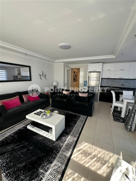 Современные апартаменты 2+1, общей площадью 120 м2, в 15-ти минутах ходьбы от моря.-id-4002-фото-2