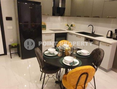 Небольшая современная квартира с прекрасным ремонтом и стильным дизайном в самом центре Аланьи. Описание:-id-4004-фото-2