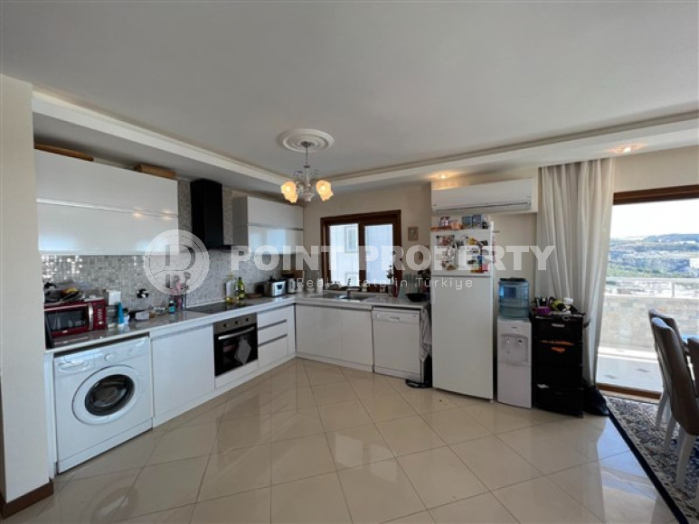 An advantageous offer - a spacious 3+1 duplex on the 5th floor with an attic in the Mahmutlar area at a very attractive price.-id-4006-photo-2