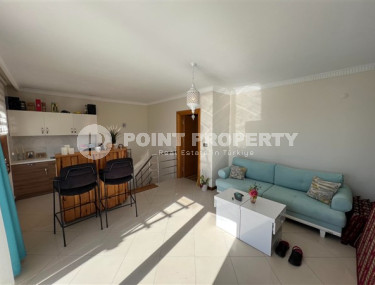 An advantageous offer - a spacious 3+1 duplex on the 5th floor with an attic in the Mahmutlar area at a very attractive price.-id-4006-photo-3