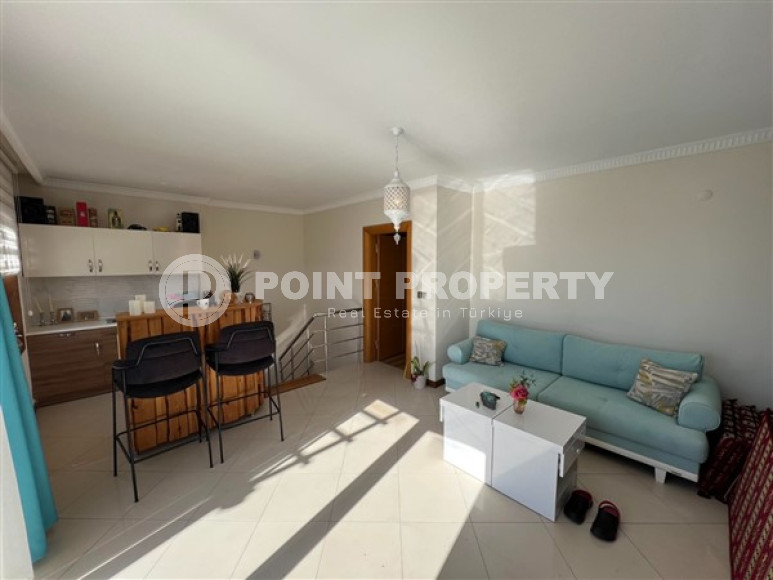 An advantageous offer - a spacious 3+1 duplex on the 5th floor with an attic in the Mahmutlar area at a very attractive price.-id-4006-photo-3