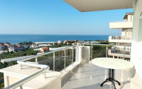 Large duplex on the 4th floor with attic with luxurious panoramic sea views in the quiet Demirtas area.-id-4007-photo-1