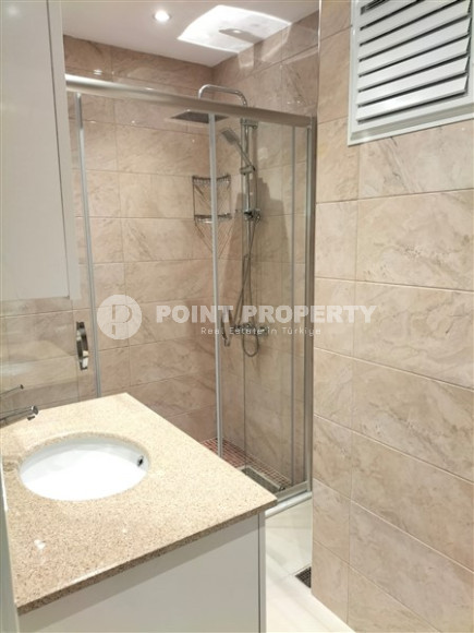 Large duplex on the 4th floor with attic with luxurious panoramic sea views in the quiet Demirtas area.-id-4007-photo-16