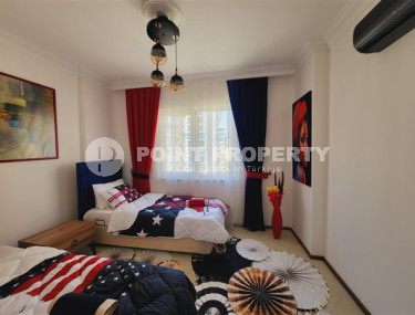 Spacious 2+1 apartment on the 4th floor in the center of the popular Mahmutlar area.-id-4008-photo-5