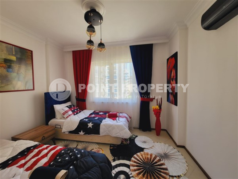 Spacious 2+1 apartment on the 4th floor in the center of the popular Mahmutlar area.-id-4008-photo-5