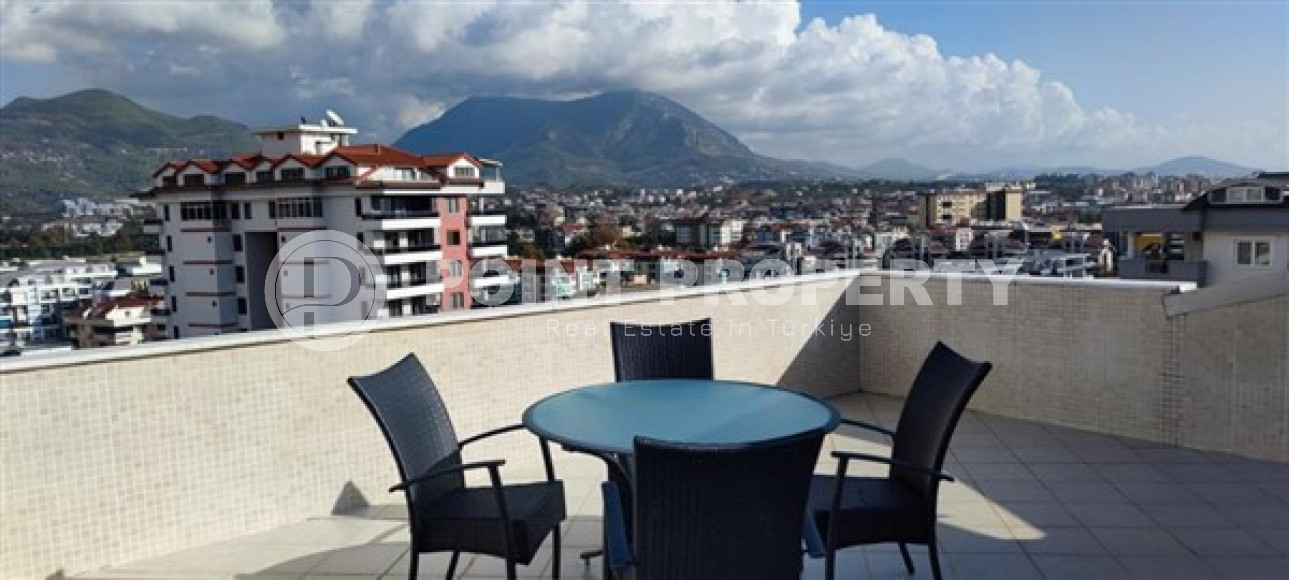 Bright modern duplex 3+1 on the 10th floor with an attic with a gorgeous panoramic view of the mountains.-id-4009-photo-16