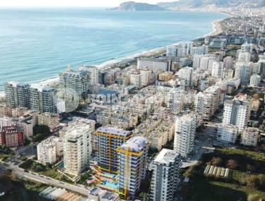 Luxury apartment 70 m2 in a residence under construction 100 meters from the sea, Mahmutlar-id-4016-photo-4