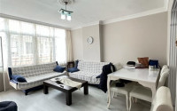 Bright 2+1 apartment with a classic interior in the center of Mahmutlar.-id-4020-photo-1