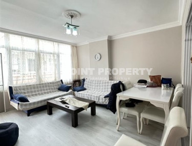 Bright 2+1 apartment with a classic interior in the center of Mahmutlar.-id-4020-photo-1