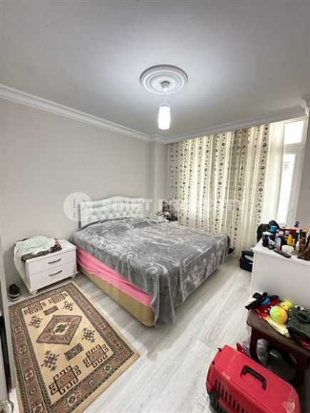 Bright 2+1 apartment with a classic interior in the center of Mahmutlar.-id-4020-photo-5