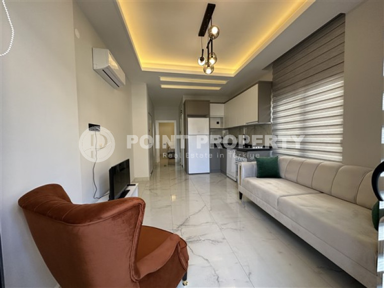 Небольшая современная квартира 1+1 в новом доме, введенном в эксплуатацию в 2022 году.-id-4024-фото-2