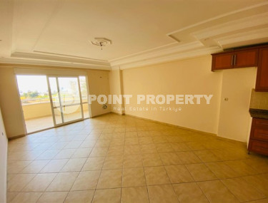 Apartment 2+1 with fine finishing 250 meters from the sea in the center of Alanya's popular Mahmutlar area.-id-4026-photo-1
