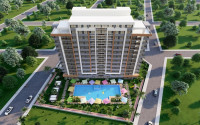New project in Mersin - apartments with one and two bedrooms on different floors in a house with a swimming pool and a garden. The date for putting the facility into operation is the end of January 2025.-id-4029-photo-1