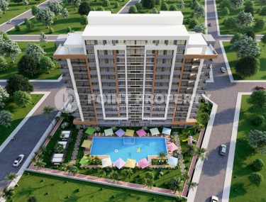 New project in Mersin - apartments with one and two bedrooms on different floors in a house with a swimming pool and a garden. The date for putting the facility into operation is the end of January 2025.-id-4029-photo-1