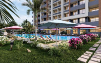 New project in Mersin - apartments with one and two bedrooms on different floors in a house with a swimming pool and a garden. The date for putting the facility into operation is the end of January 2025.-id-4029-photo-11
