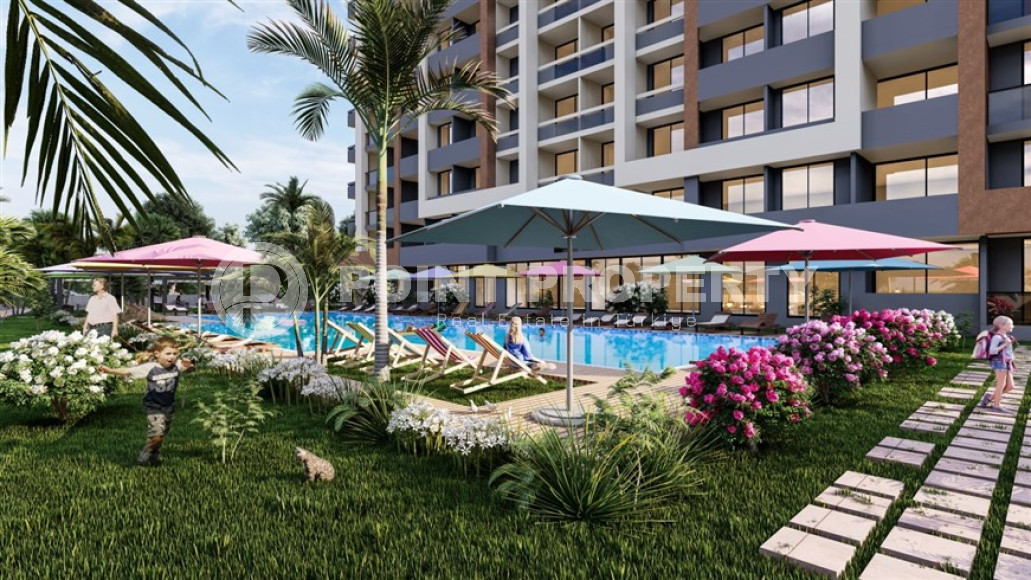 Новый проект в Мерсине – квартиры с одной и двумя спальнями на разных этажах в доме с бассейном и садом. Срок введения объекта в эксплуатацию – конец января 2025 года.-id-4029-фото-11