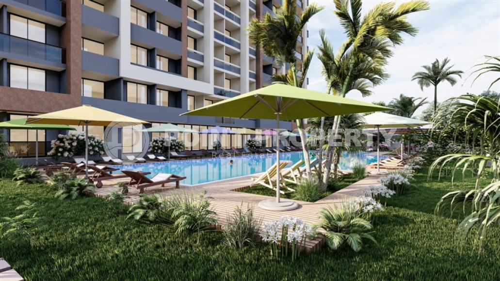 Новый проект в Мерсине – квартиры с одной и двумя спальнями на разных этажах в доме с бассейном и садом. Срок введения объекта в эксплуатацию – конец января 2025 года.-id-4029-фото-12