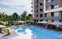 New project in Mersin - apartments with one and two bedrooms on different floors in a house with a swimming pool and a garden. The date for putting the facility into operation is the end of January 2025.-id-4029-photo-13