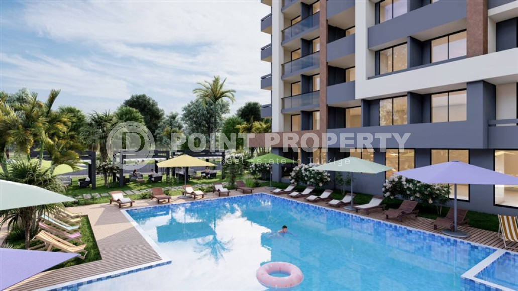 Новый проект в Мерсине – квартиры с одной и двумя спальнями на разных этажах в доме с бассейном и садом. Срок введения объекта в эксплуатацию – конец января 2025 года.-id-4029-фото-13