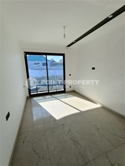 Дуплексные апартаменты 3+1 с площадью 140 м2 в районе Каргыджак. Продаются без мебели.-id-4031-фото-9