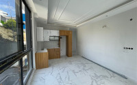 Apartment 1+1 with fine finishing in a house at the final stage of construction. The date for putting the facility into operation is May 2023.-id-4046-photo-2